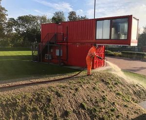 Hydroseeding a counter-terrorism bund at football ground