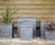 Clayfibre faux lead planters complement sandstone property 3