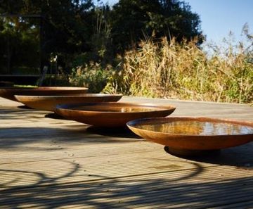 Corten steel curved water bowls