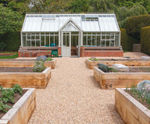 Ground reinforcement system for vegetable garden paths