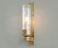 Raydon brass wall light with fluted glass