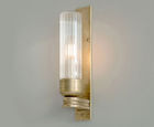 Raydon brass wall light with fluted glass