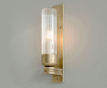 Raydon brass wall light with fluted glass