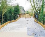Bespoke 5-bar estate fencing for historic bridge