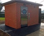 Brick-clad public toilet block