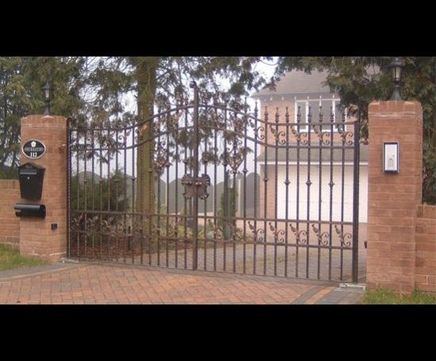 Steel ornamental driveway swing gates