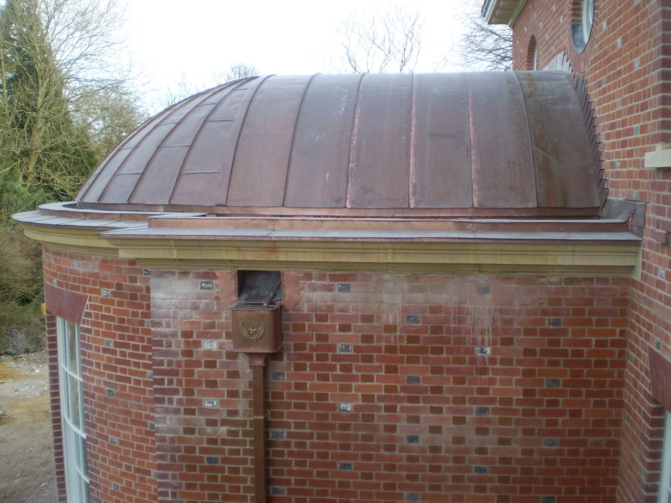 Copper downpipe and hidden gutters, stately home Metal Gutta ESI
