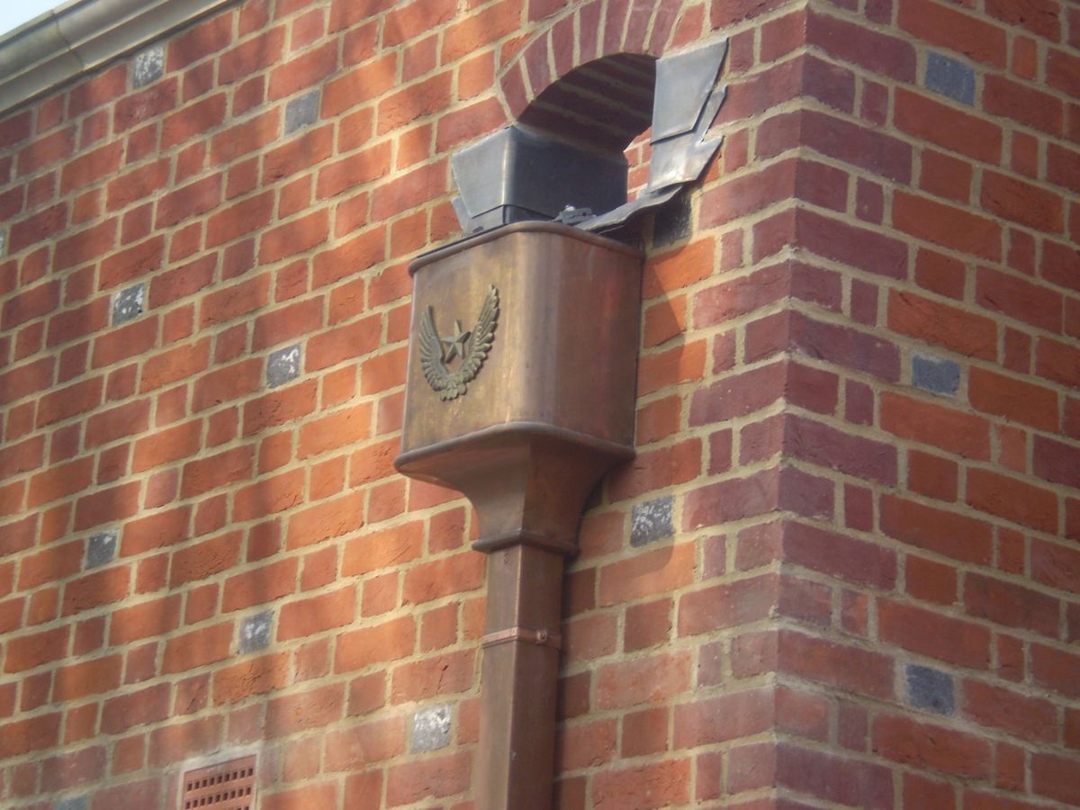 Copper downpipe and hidden gutters, stately home Metal Gutta ESI