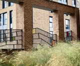 40m-long metal fence with mosaic inserts – Nurtur House - on this page