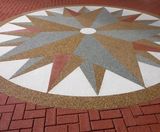 Compass design resin bound surfacing for Justice Centre - on this page