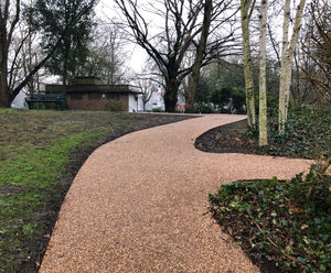 Porous resin bound surface for pathways in popular park