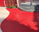 Colourful light-emitting surfacing for private garden - on this page