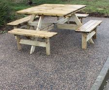 Recycled rubber and aggregate surfacing for seating area