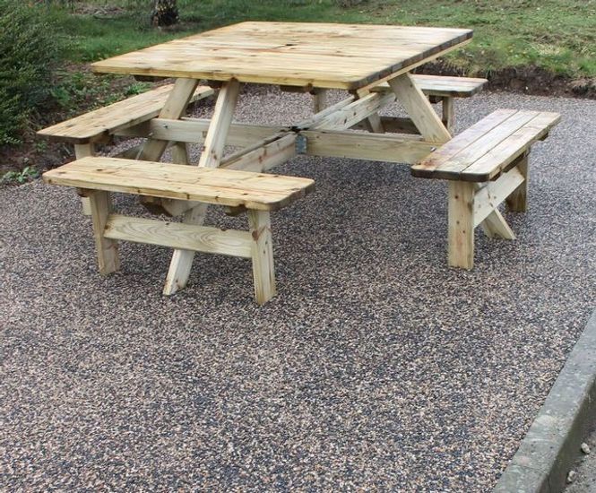 Recycled rubber and aggregate surfacing for seating area