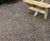 Recycled rubber and aggregate surfacing for seating area 2