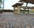 Recycled rubber and aggregate surfacing for seating area 1
