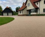 Porous resin bound surfacing for sloping driveway - on this page