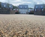 Addaset resin bound pathways for new housing development - on this page