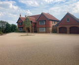 Seamless driveway created using Stonebound surfacing - on this page