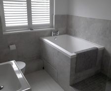 Compact Calyx deep soaking tub for private home