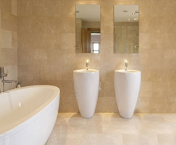 Linear honed cream marble floor and wall tiles