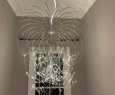 Organic stainless steel and fibre optic pendant light