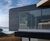 Natural slate rainscreen cladding for coastal home 0