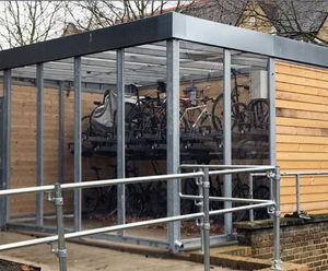 Ascot - enclosed cycle compound for two-tier bike racks