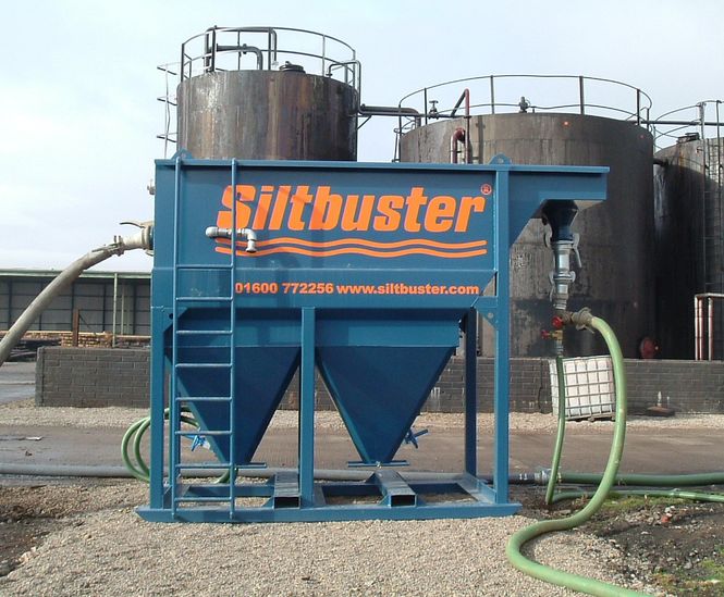 Tilted plate oil-water separators