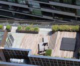 Adjustable pedestal support system for mixed use site - on this page