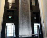 7m-tall AquaVeil® illuminated water wall for foyer