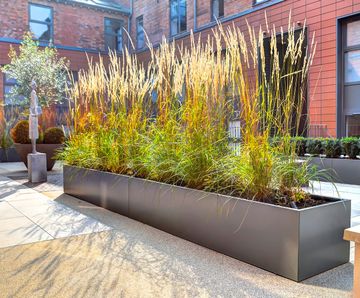 Planters for communal courtyard, residential development