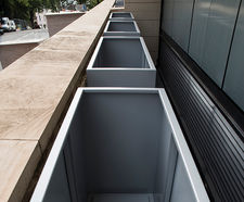 46 large bespoke zintec steel trough planters for university