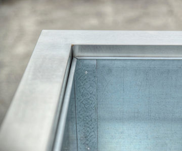 Bespoke stainless steel tree planters – Havering