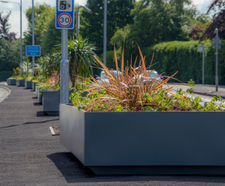 Bespoke powder-coated steel planters for highway scheme