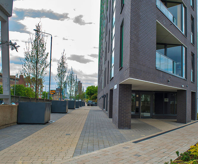 Bespoke steel tree planters for Telford Homes 