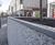Large, granite-clad steel planters for streetscape 7