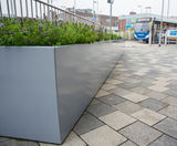 Bespoke powder-coated steel planters for transport hub - on this page