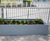 Bespoke powder-coated steel planters for transport hub 5