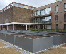 Large bespoke steel planters for residential development