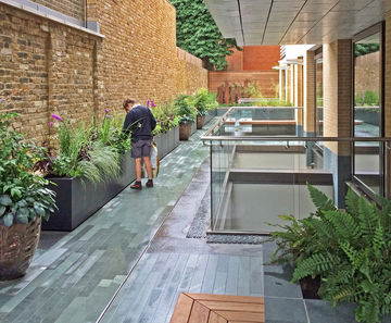 Custom moveable steel planters for Kensington residence