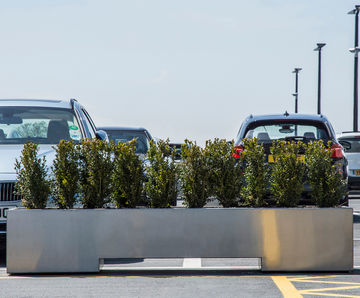 Bespoke movable steel planters for new car dealership
