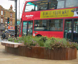 Bespoke corten steel planter-benches for public realm
