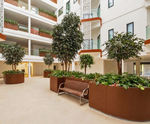 Large bespoke steel planters for residential atrium