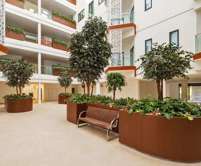 Large bespoke steel planters for residential atrium