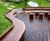 Bespoke curved timber seating for courtyard garden 1