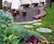 Bespoke curved timber seating for courtyard garden 0
