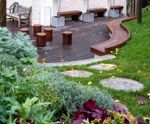 Bespoke curved timber seating for courtyard garden
