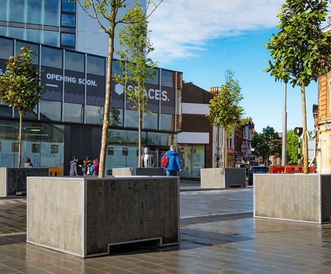 Granite-clad zintec steel planters - Woking town centre