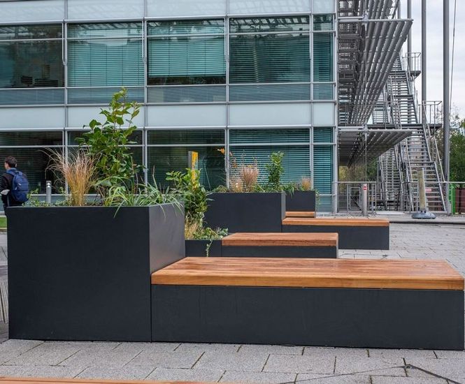 Bespoke stainless steel seating planters, Chiswick Park 